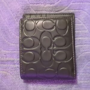 Coach Wallet. Brand new. Still has Coach Card in sleeve.